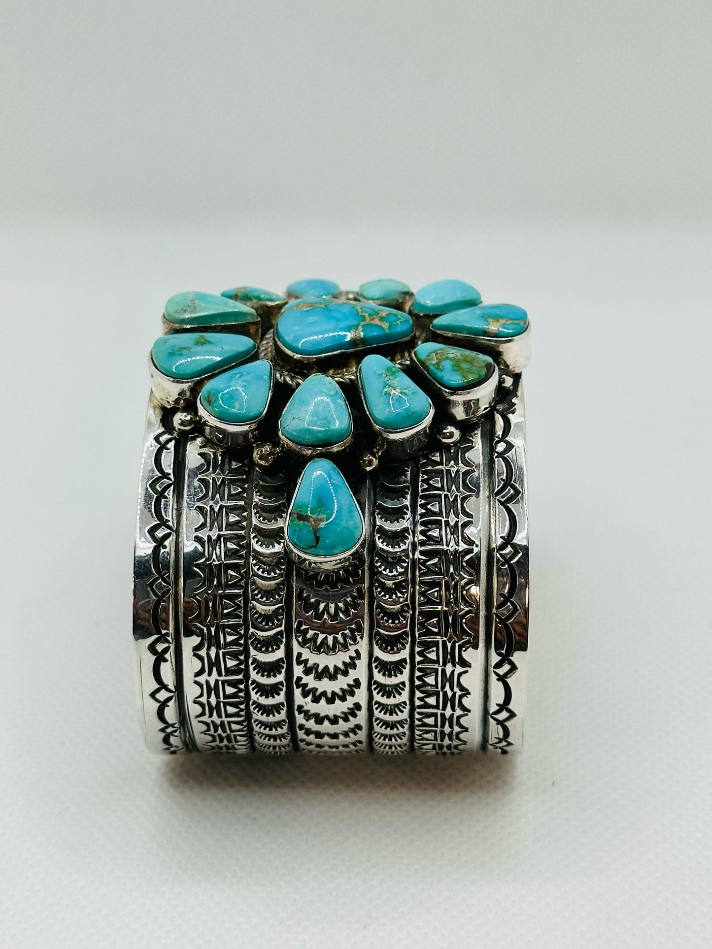 Bracelet Set With 14 Kingman Turquoise Stones Designed By Navajo Artist MAYNARD GARCIA .