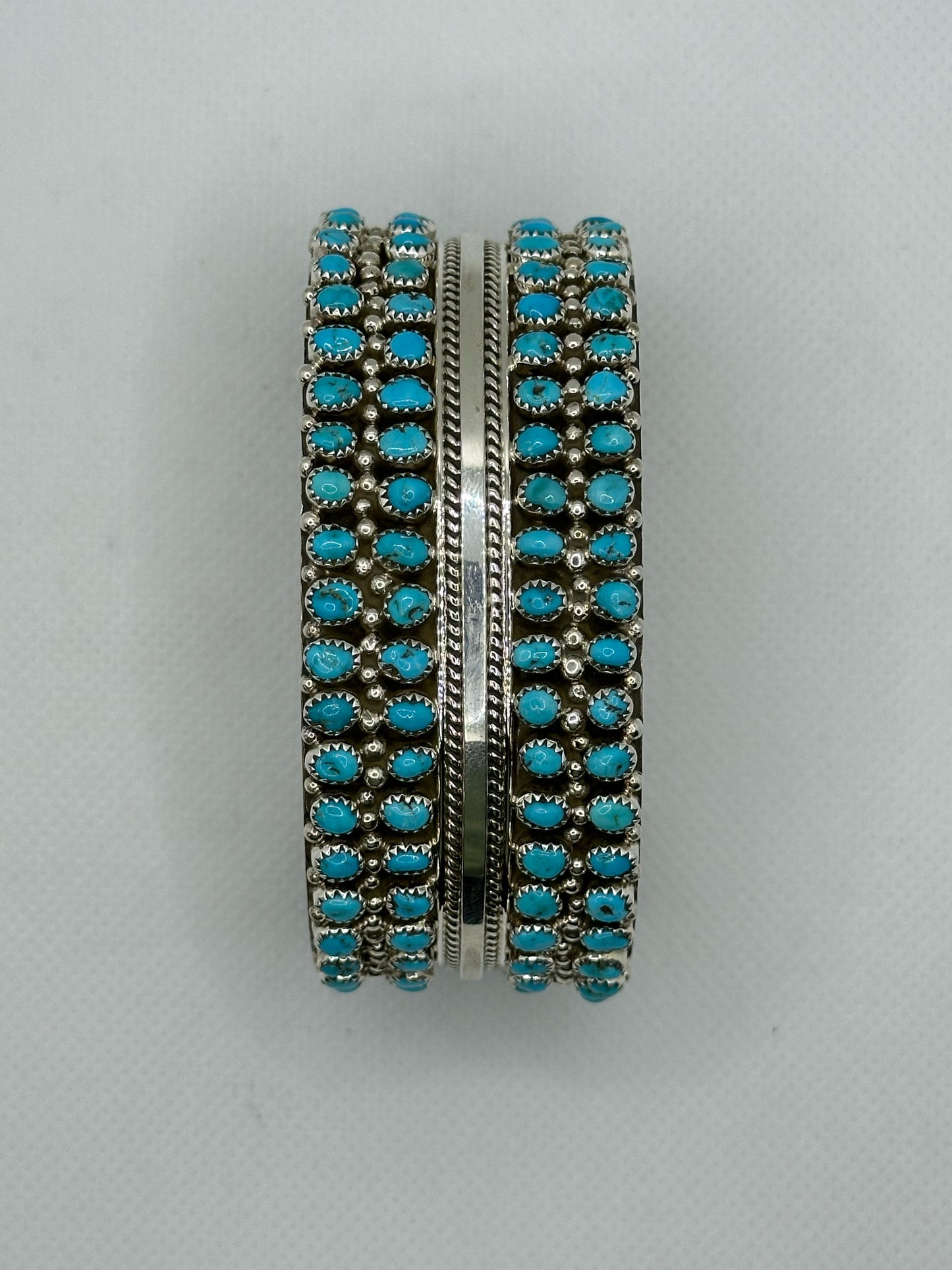 Turquoise Navajo handmade sterling silver bracelet .
