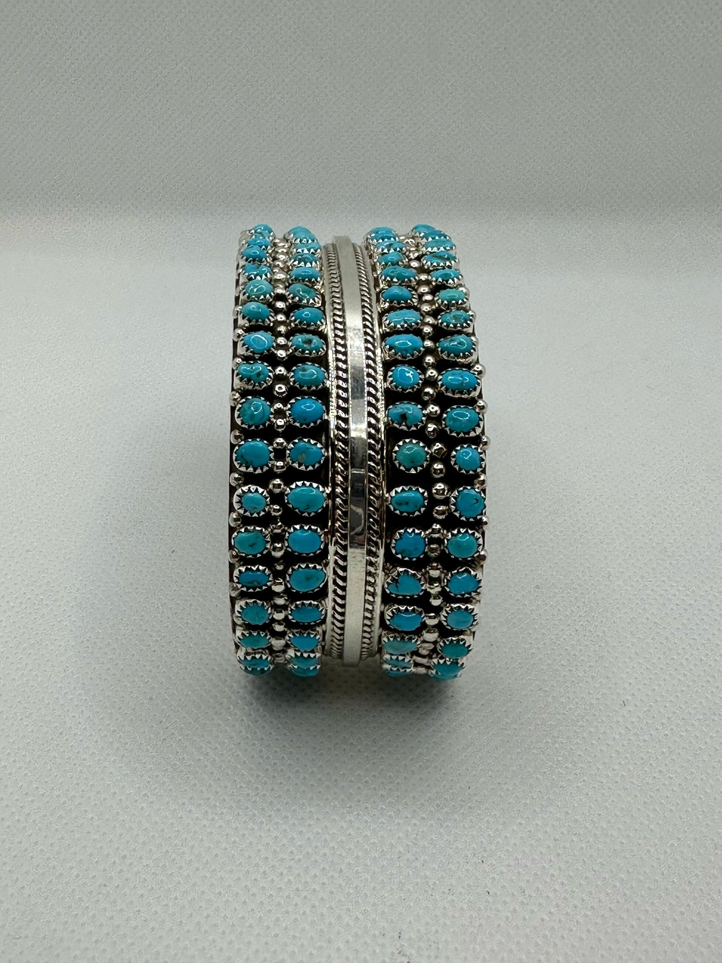 Turquoise Navajo handmade sterling silver bracelet .