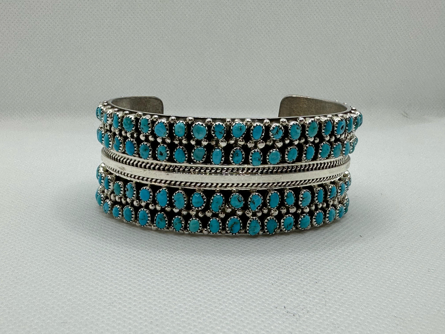 Turquoise Navajo handmade sterling silver bracelet .
