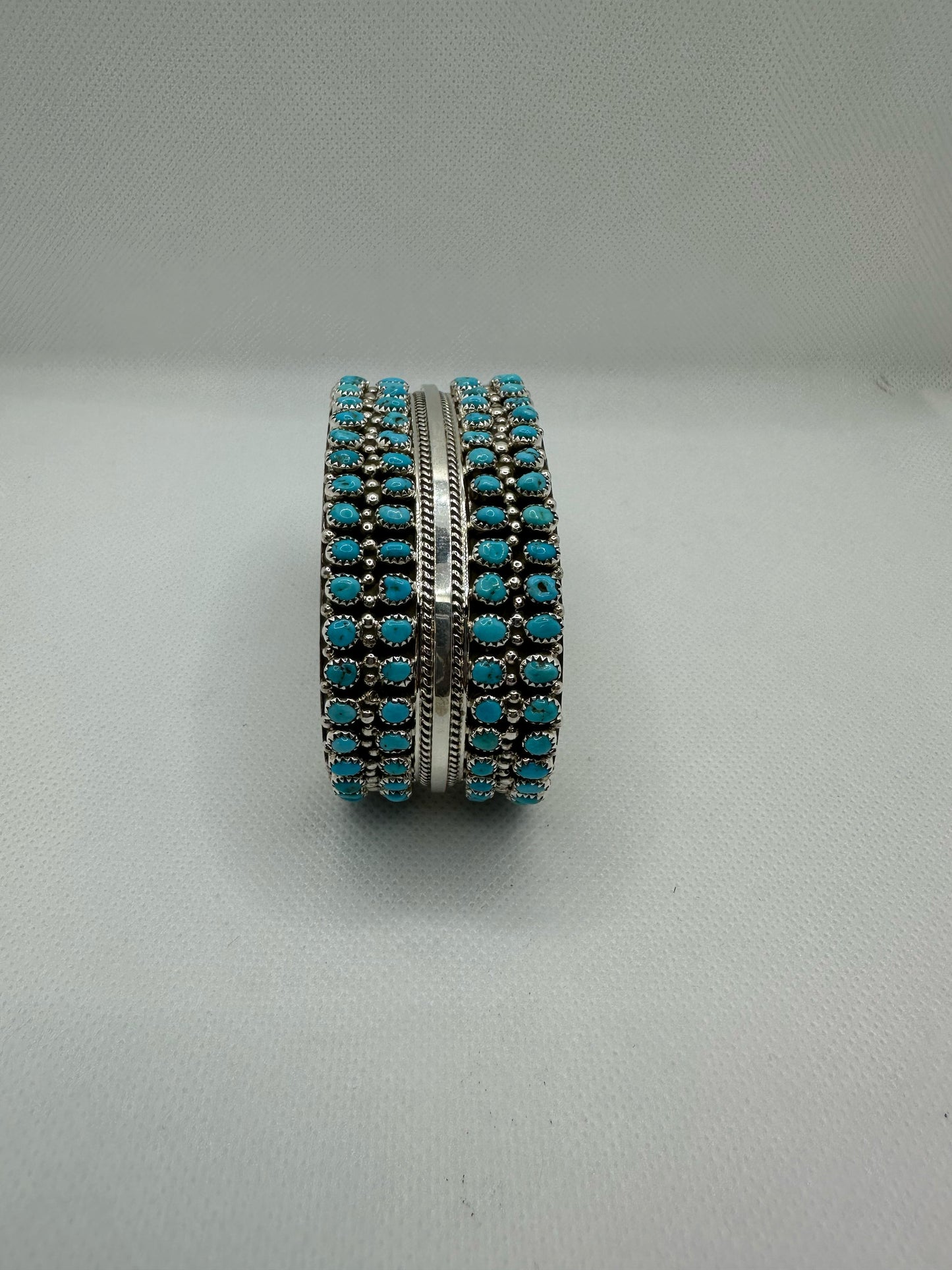 Turquoise Navajo handmade sterling silver bracelet .