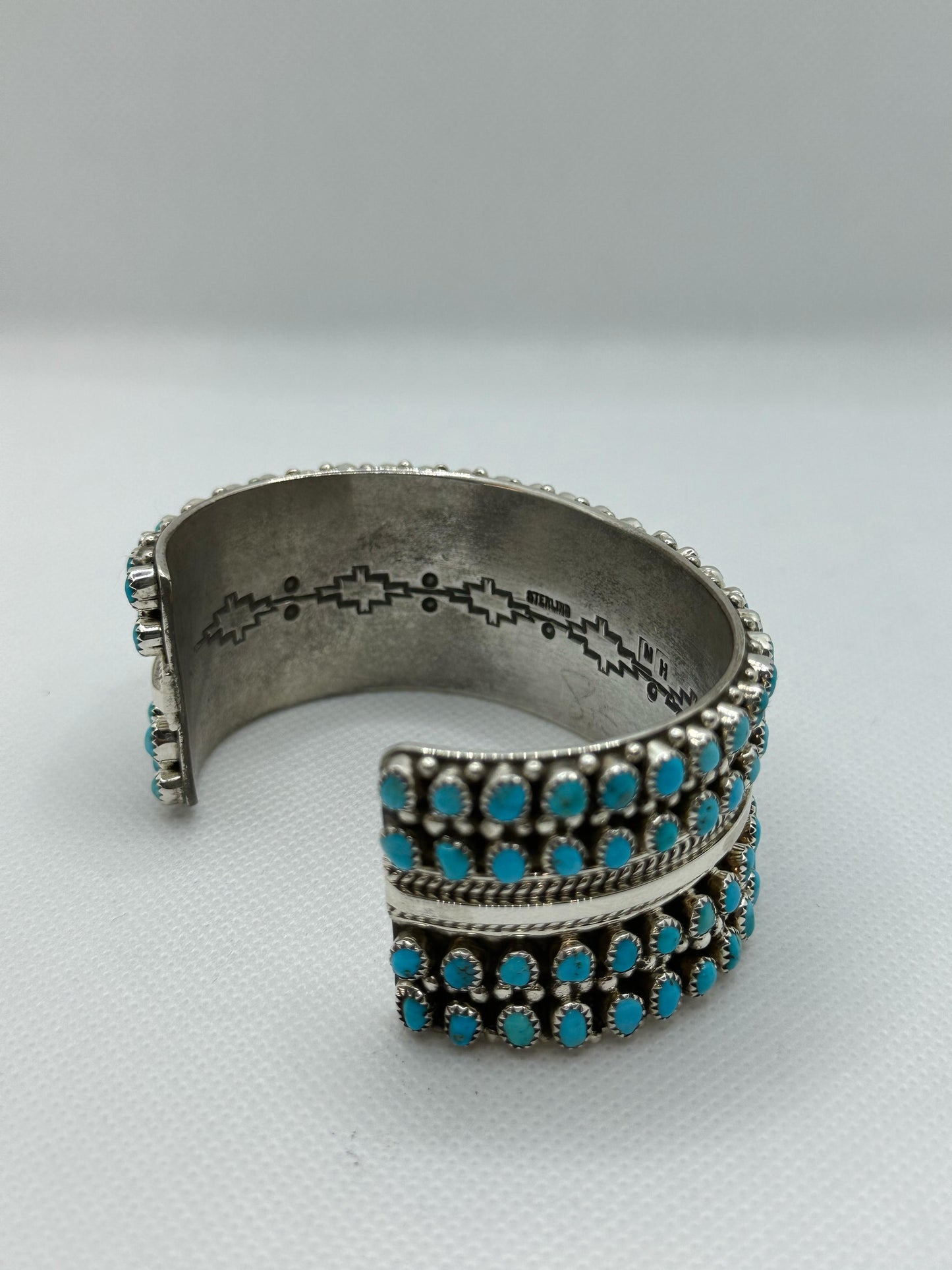 Turquoise Navajo handmade sterling silver bracelet .