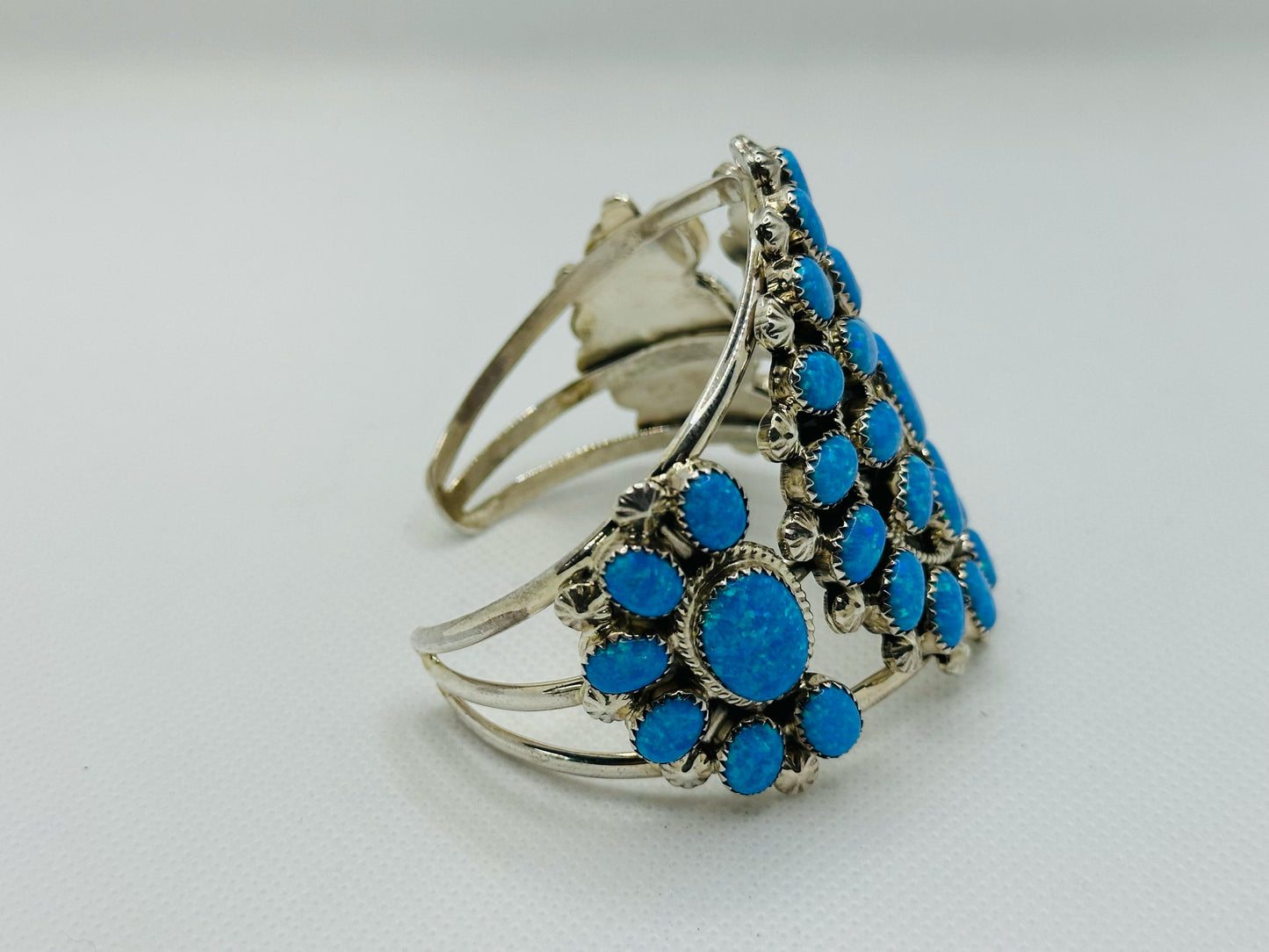 Gorgeous High-Quality Cuff Bracelet, made of 925 Solid Sterling Silver set with 41 Genuine Blue Opal.