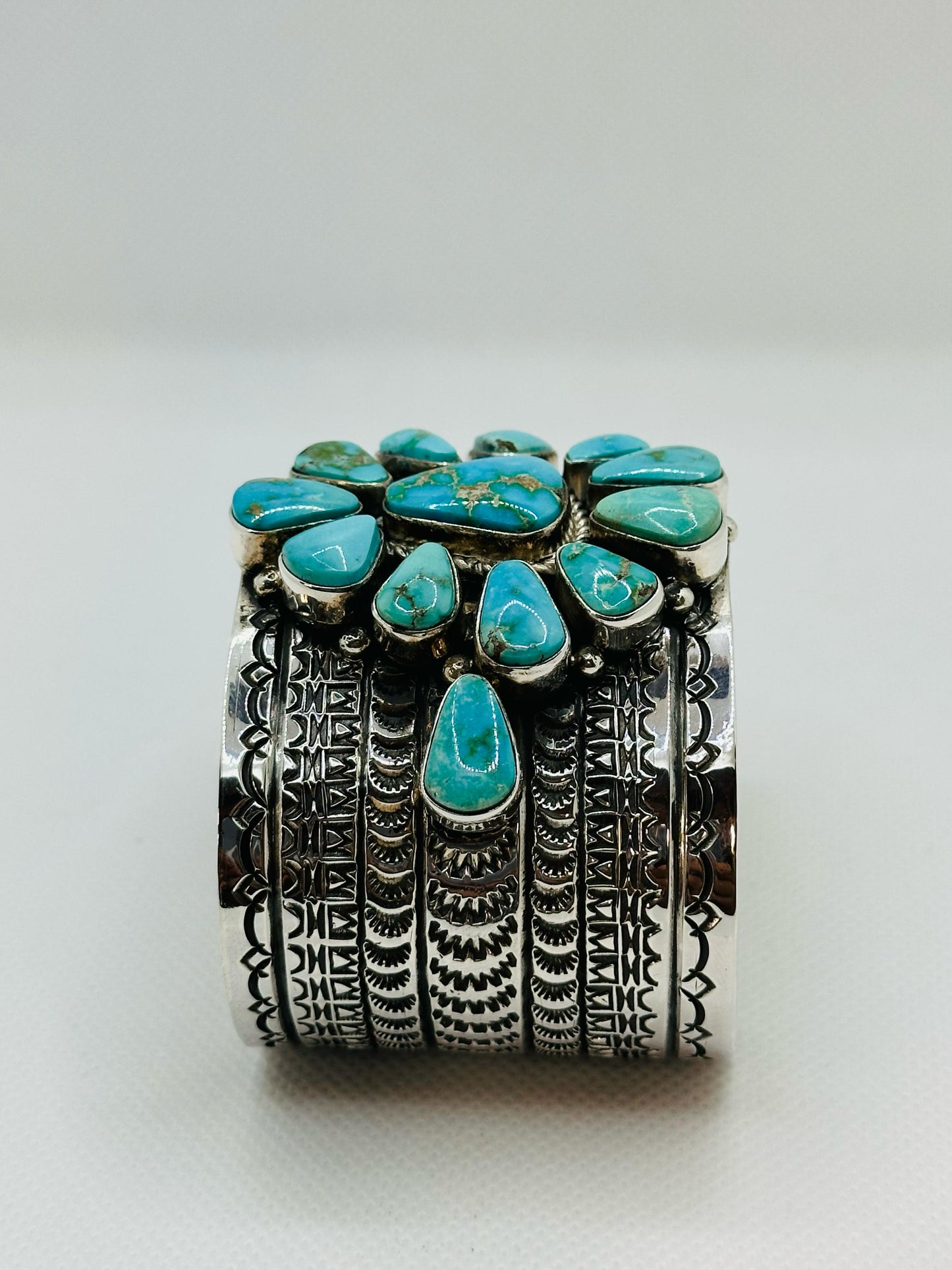Bracelet Set With 14 Kingman Turquoise Stones Designed By Navajo Artist MAYNARD GARCIA .