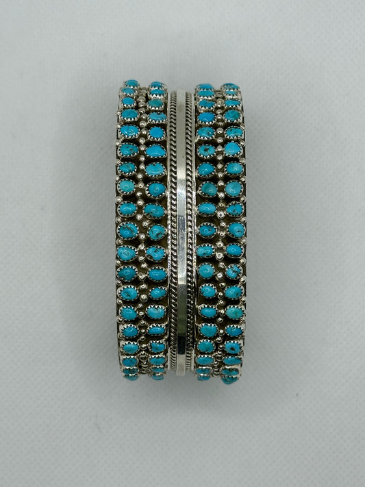Turquoise Navajo handmade sterling silver bracelet .